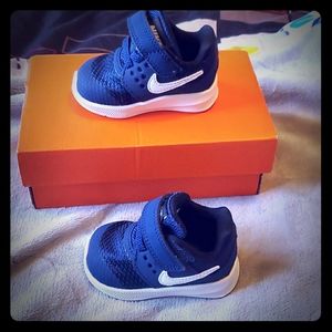 Navy blue and white Nike